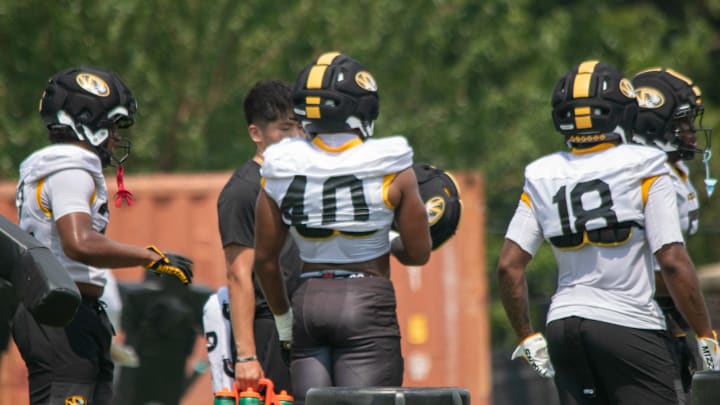 Aug 6, 2025; Columbia, MO, USA; Missouri Tigers linebackers Josiah Trotter (40) and Jeremiah Beasley (18) get ready for a defensive drill during a fall camp practice at Mizzou Athletic Training Complex. Aug 6, 2025; Columbia, MO, USA; Missouri Tigers linebackers Josiah Trotter (40) and Jeremiah Beasley (18) get ready for a defensive drill during a fall camp practice at Mizzou Athletic Training Complex.