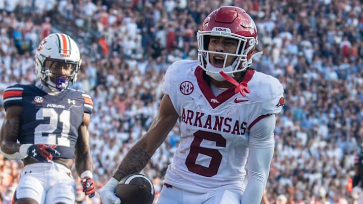 Arkansas Razorbacks wide receiver Isaiah Sategna (6) celebrates his touchdown catch against the Auburn Tigers at Jordan-Hare Stadium in Auburn, Ala. Arkansas Razorbacks wide receiver Isaiah Sategna (6) celebrates his touchdown catch against the Auburn Tigers at Jordan-Hare Stadium in Auburn, Ala.