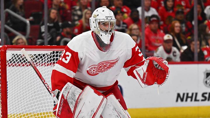 Oct 1, 2022; Chicago, Illinois, USA;  Detroit Red Wings goaltender Sebastian Cossa (33) defends the net against the Chicago Blackhawks at United Center. Mandatory Credit: Jamie Sabau-Imagn Images