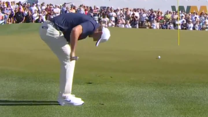 Scottie Scheffler was frustrated with a chip shot he had on Hole 18 at the Phoenix Open.