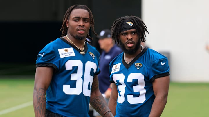 Jacksonville Jaguars running back LeQuint Allen (36) and running back Bhayshul Tuten (33) look on during a rookie minicamp at Miller Electric Center Saturday, May 10, 2025 in Jacksonville, Fla. [Corey Perrine/Florida Times-Union]