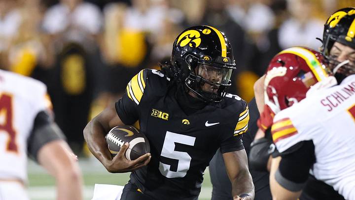 Sep 12, 2026; Iowa City, Iowa, USA; Iowa Hawkeyes running back Nathan McNeil (5) carries the ball against the Iowa State Cyclones during the fourth quarter at Kinnick Stadium. Mandatory Credit: Reese Strickland-Imagn Images Sep 12, 2026; Iowa City, Iowa, USA; Iowa Hawkeyes running back Nathan McNeil (5) carries the ball against the Iowa State Cyclones during the fourth quarter at Kinnick Stadium. Mandatory Credit: Reese Strickland-Imagn Images