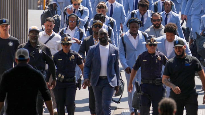 Sep 14, 2024; Pasadena, California, USA;  UCLA Bruins head coach DeShaun Foster arrives before the game against the Indiana Hoosiers at Rose Bowl. Mandatory Credit: Kirby Lee-Imagn Images