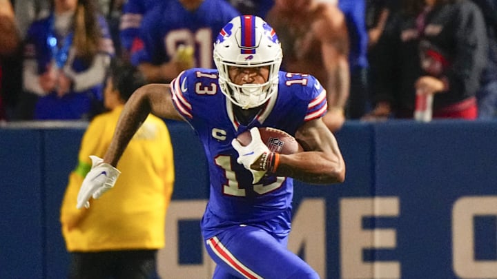 Oct 26, 2023; Orchard Park, New York, USA; Buffalo Bills wide receiver Gabe Davis (13) runs with the ball after making a catch against the Tampa Bay Buccaneers during the second half at Highmark Stadium. Mandatory Credit: Gregory Fisher-Imagn Images