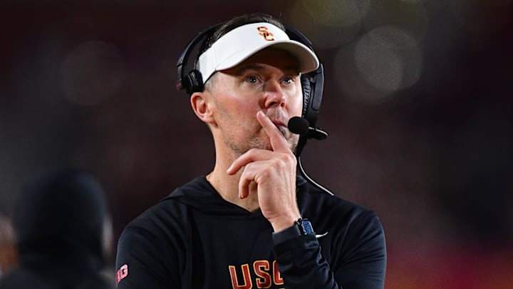 Nov 7, 2025; Los Angeles, California, USA; Southern California Trojans head coach Lincoln Riley watches game action against the Northwestern Wildcats during the second half at the Los Angeles Memorial Coliseum. Mandatory Credit: Gary A. Vasquez-Imagn Images Nov 7, 2025; Los Angeles, California, USA; Southern California Trojans head coach Lincoln Riley watches game action against the Northwestern Wildcats during the second half at the Los Angeles Memorial Coliseum. Mandatory Credit: Gary A. Vasquez-Imagn Images