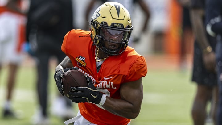 Jan 28, 2025; Mobile, AL, USA; American team running back RJ Harvey of UCF (22) runs after a catch during Senior Bowl practice for the American team at Hancock Whitney Stadium. Mandatory Credit: Vasha Hunt-Imagn Images Jan 28, 2025; Mobile, AL, USA; American team running back RJ Harvey of UCF (22) runs after a catch during Senior Bowl practice for the American team at Hancock Whitney Stadium. Mandatory Credit: Vasha Hunt-Imagn Images