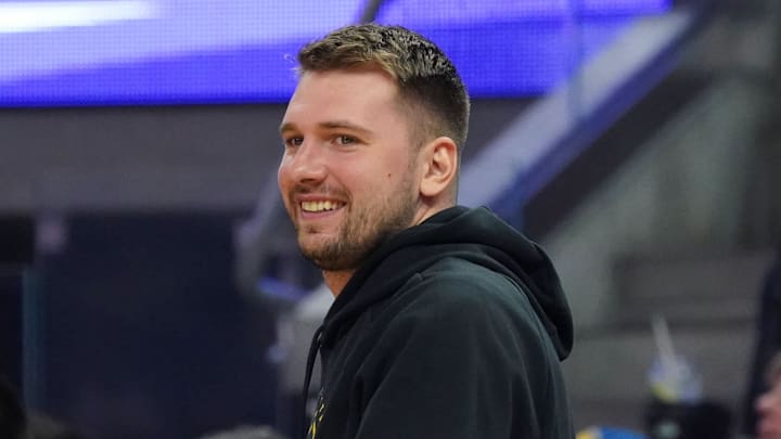 Oct 5, 2025; San Francisco, California, USA; Los Angeles Lakers forward/guard Luka Doncic (77) smiles from the sidelines during the second quarter against the Golden State Warriors at Chase Center. Mandatory Credit: David Gonzales-Imagn Images Oct 5, 2025; San Francisco, California, USA; Los Angeles Lakers forward/guard Luka Doncic (77) smiles from the sidelines during the second quarter against the Golden State Warriors at Chase Center. Mandatory Credit: David Gonzales-Imagn Images