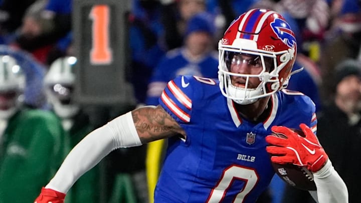 Jan 4, 2026; Orchard Park, New York, USA; Buffalo Bills wide receiver Keon Coleman (0) carries the ball against the New York Jets during the third quarter at Highmark Stadium. Mandatory Credit: Gregory Fisher-Imagn Images