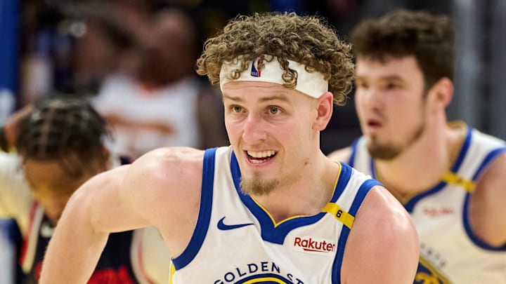 Apr 13, 2025; San Francisco, California, USA; Golden State Warriors guard Brandin Podziemski (2) reacts as he runs on the court after making a basket against the LA Clippers during the fourth quarter at Chase Center. Mandatory Credit: Robert Edwards-Imagn Images