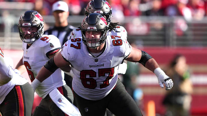 Nov 19, 2023; Santa Clara, California, USA; Tampa Bay Buccaneers offensive tackle Luke Goedeke (67) blocks against San Francisco 49ers linebacker Fred Warner (54) during the second quarter at Levi's Stadium. Mandatory Credit: Darren Yamashita-Imagn Images Nov 19, 2023; Santa Clara, California, USA; Tampa Bay Buccaneers offensive tackle Luke Goedeke (67) blocks against San Francisco 49ers linebacker Fred Warner (54) during the second quarter at Levi's Stadium. Mandatory Credit: Darren Yamashita-Imagn Images