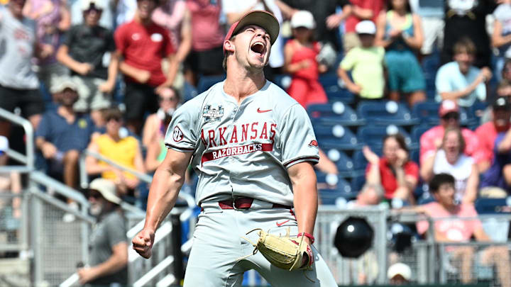 Jun 16, 2025; Omaha, Neb, USA; Arkansas Razorbacks starting pitcher Gage Wood (14) celebrates at the end of the eighth inning against the Murray State Racers at Charles Schwab Field.