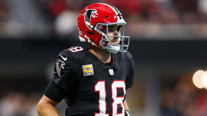 Sep 29, 2024; Atlanta, Georgia, USA; Atlanta Falcons quarterback Kirk Cousins (18) runs on the field against the New Orleans Saints in the second quarter at Mercedes-Benz Stadium. Mandatory Credit: Brett Davis-Imagn Images