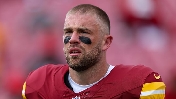 Sep 8, 2024; Tampa, Florida, USA; Washington Commanders tight end Zach Ertz (86) warms up before a game against the Tampa Bay Buccaneers at Raymond James Stadium. Mandatory Credit: Nathan Ray Seebeck-Imagn Images