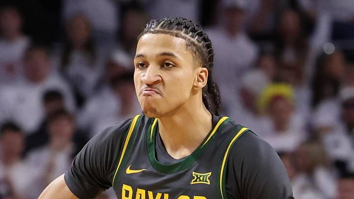 Feb 7, 2026; Ames, Iowa, USA; Baylor Bears guard Cameron Carr (43) celebrates are a basket against the Iowa State Cyclones during the first half at James H. Hilton Coliseum. Mandatory Credit: Reese Strickland-Imagn Images