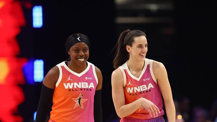 Jul 20, 2024; Phoenix, AZ, USA; Team WNBA guard Caitlin Clark (22) and Team WNBA player Arike Ogunbowale (24) reacts after a play during the first half against the USA Women's National Team at Footprint Center. Mandatory Credit: Mark J. Rebilas-Imagn Images