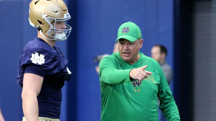 Notre Dame Offensive Coordinator Mike Denbrock talks to players at Notre Dame spring football practice Thursday, March 7, 2024, at the Irish Athletics Center in South Bend. Notre Dame Offensive Coordinator Mike Denbrock talks to players at Notre Dame spring football practice Thursday, March 7, 2024, at the Irish Athletics Center in South Bend.