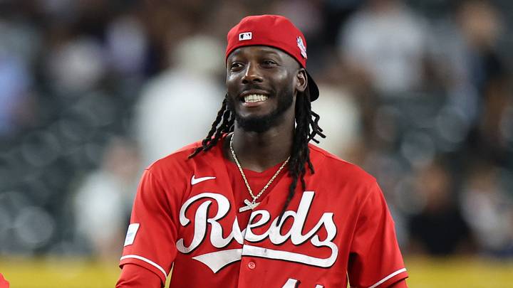 Cincinnati Reds infielder Elly De La Cruz (44) smiles