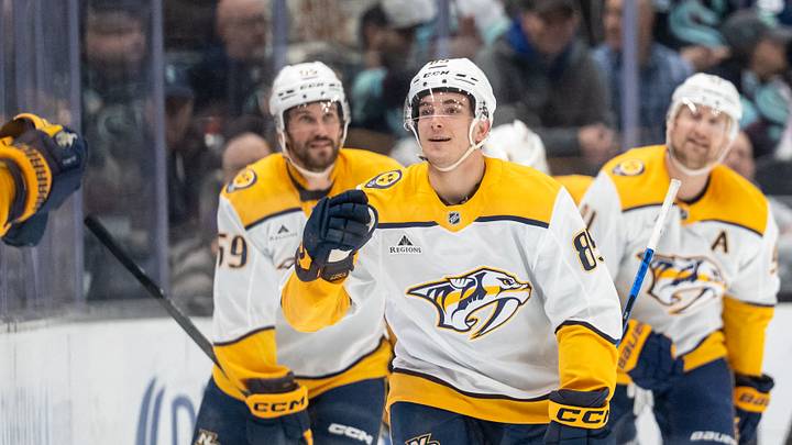 Mar 10, 2026; Seattle, Washington, USA; Nashville Predators defenseman Ryan Ufko (85), third from right, celebrates a goal during the second period against the Seattle Kraken at Climate Pledge Arena. Mandatory Credit: Stephen Brashear-Imagn Images Mar 10, 2026; Seattle, Washington, USA; Nashville Predators defenseman Ryan Ufko (85), third from right, celebrates a goal during the second period against the Seattle Kraken at Climate Pledge Arena. Mandatory Credit: Stephen Brashear-Imagn Images