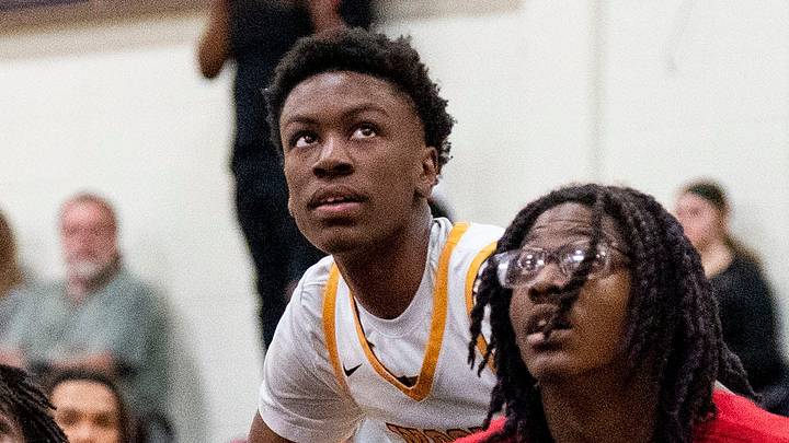 Northeast's Kyree Williams (0) and Makai Autry (13) try to keep Archbishop Wood's Jaydn Jenkins (32) from a rebound during their District 12 playoff boys' basketball game in Wyndmoor on Tuesday, Feb. 27, 2024. Northeast's Kyree Williams (0) and Makai Autry (13) try to keep Archbishop Wood's Jaydn Jenkins (32) from a rebound during their District 12 playoff boys' basketball game in Wyndmoor on Tuesday, Feb. 27, 2024.