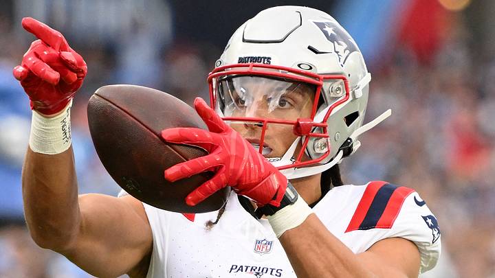 Oct 19, 2025; Nashville, Tennessee, USA; New England Patriots wide receiver Mack Hollins (13) reacts after making a catch against the Tennessee Titans during the first half at Nissan Stadium. Mandatory Credit: Steve Roberts-Imagn Images