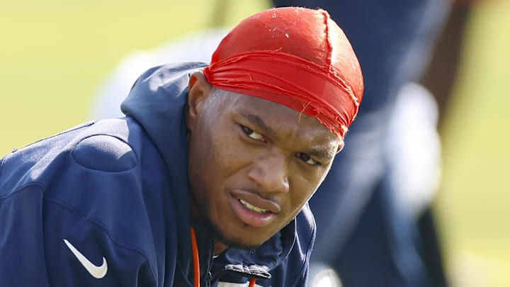 Jul 23, 2025; Lake Forest, IL, USA; Chicago Bears wide receiver DJ Moore (2) warms up during training camp at Halas Hall. Mandatory Credit: Kamil Krzaczynski-Imagn Images