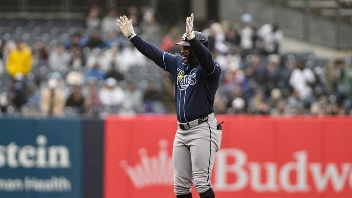 May 24, 2026; Bronx, New York, USA; Tampa Bay Rays designated hitter Yandy Díaz (2) reacts after hitting a double against the New York Yankees during the eighth inning at Yankee Stadium. 