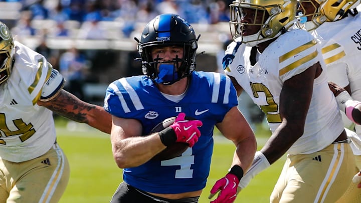 Oct 18, 2025; Durham, North Carolina, USA;  Duke Blue Devils running back Anderson Castle (4) runs with the ball during the first half of the game against Georgia Tech Yellow Jackets at Wallace Wade Stadium. Mandatory Credit: Jaylynn Nash-Imagn Images