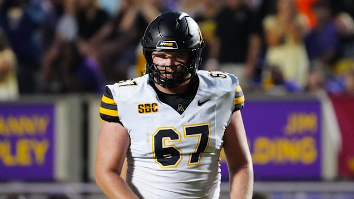 Sep 14, 2024; Greenville, North Carolina, USA; Appalachian State Mountaineers offensive lineman Thomas Shrader (67) gets ready for the play against the East Carolina Pirates during the second half at Dowdy-Ficklen Stadium. Mandatory Credit: James Guillory-Imagn Images Sep 14, 2024; Greenville, North Carolina, USA; Appalachian State Mountaineers offensive lineman Thomas Shrader (67) gets ready for the play against the East Carolina Pirates during the second half at Dowdy-Ficklen Stadium. Mandatory Credit: James Guillory-Imagn Images
