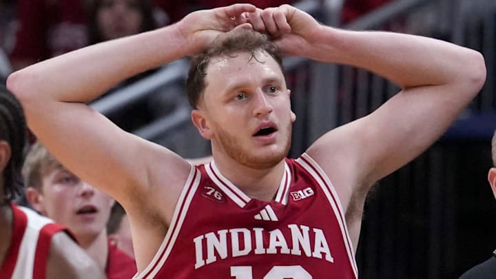 Indiana Hoosiers forward Tucker DeVries (12) reacts to a call against the Louisville Cardinals at Gainbridge Fieldhouse.