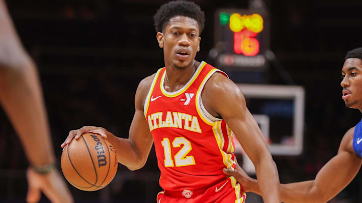 Dec 18, 2023; Atlanta, Georgia, USA; Atlanta Hawks forward De'Andre Hunter (12) dribbles against the Detroit Pistons in the first quarter at State Farm Arena. Mandatory Credit: Brett Davis-Imagn Images
Dec 18, 2023; Atlanta, Georgia, USA; Atlanta Hawks forward De'Andre Hunter (12) dribbles against the Detroit Pistons in the first quarter at State Farm Arena. Mandatory Credit: Brett Davis-Imagn Images