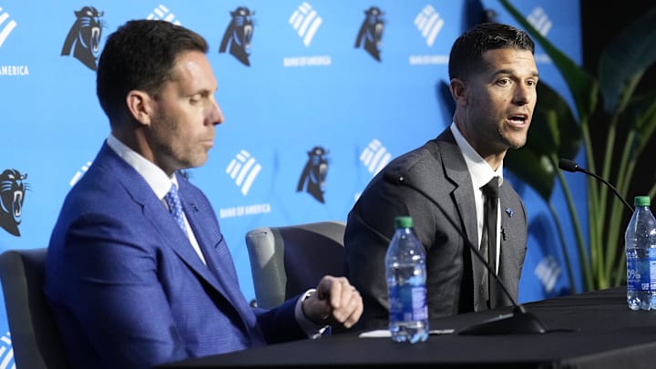 Feb 1, 2024; Charlotte, NC, USA; Carolina Panthers head coach Dave Canales speaks to the media as general manager Dan Morgan looks on during the introductory press conference at Bank of America Stadium. Mandatory Credit: Jim Dedmon-Imagn Images Feb 1, 2024; Charlotte, NC, USA; Carolina Panthers head coach Dave Canales speaks to the media as general manager Dan Morgan looks on during the introductory press conference at Bank of America Stadium. Mandatory Credit: Jim Dedmon-Imagn Images