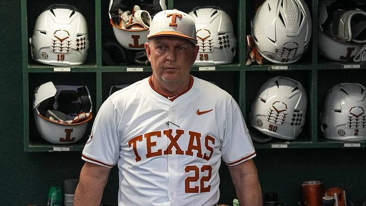Texas Longhorns head coach Jim Schlossnagle stands in the dugout ahead of the Lone Star Showdown. Texas Longhorns head coach Jim Schlossnagle stands in the dugout ahead of the Lone Star Showdown.