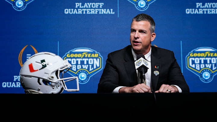 Miami (FL) Hurricanes head coach Mario Cristobal talks to media during a Cotton Bowl press conference at AT&T Stadium in Arlington, Texas prior to their College Football Playoff quarterfinal matchup on Dec. 30, 2025.