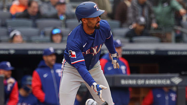 May 22, 2025; Bronx, New York, USA; Texas Rangers second baseman Marcus Semien (2) singles during the seventh inning against the New York Yankees at Yankee Stadium.