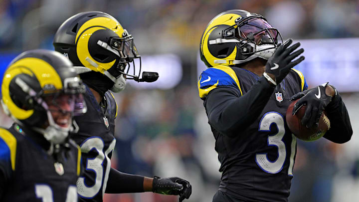 Nov 16, 2025; Inglewood, California, USA; Los Angeles Rams cornerback Darious Williams (31) celebrates after making an interception during the second half against the Seattle Seahawks at SoFi Stadium. Mandatory Credit: Jayne Kamin-Oncea-Imagn Images