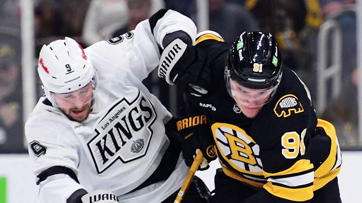 Mar 10, 2026; Boston, Massachusetts, USA; Los Angeles Kings right wing Adrian Kempe (9) and Boston Bruins defenseman Nikita Zadorov (91) battle for the puck during the first period at TD Garden. Mar 10, 2026; Boston, Massachusetts, USA; Los Angeles Kings right wing Adrian Kempe (9) and Boston Bruins defenseman Nikita Zadorov (91) battle for the puck during the first period at TD Garden.