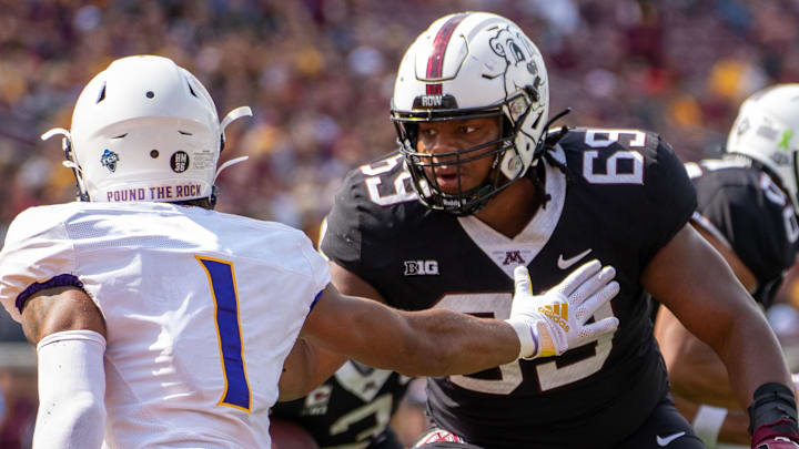 Sep 10, 2022; Minneapolis, Minnesota, USA; Minnesota Golden Gophers offensive lineman Aireontae Ersery (69) blocks Western Illinois Leathernecks defensive back JJ Ross (1) in the second quarter at Huntington Bank Stadium. Mandatory Credit: Matt Blewett-Imagn Images