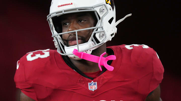 Arizona Cardinals running back Trey Benson (33) takes the field before their game against the Las Vegas Raiders at State Farm Stadium in Glendale, on Aug. 23, 2025.