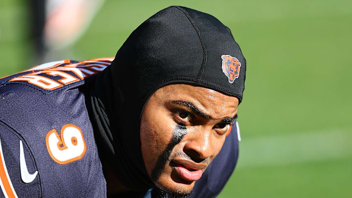 Nov 23, 2025; Chicago, Illinois, USA; Chicago Bears safety Jaquan Brisker (9) stretches before the game against the Pittsburgh Steelers at Soldier Field. Mandatory Credit: Mike Dinovo-Imagn Images