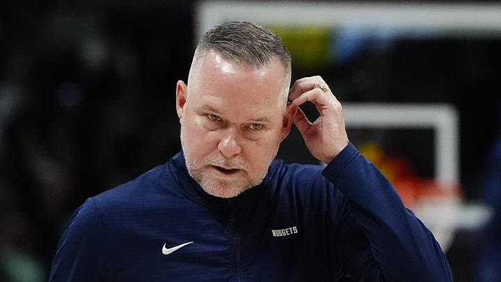 Mar 15, 2025; Denver, Colorado, USA; Denver Nuggets head coach Michael Malone following a timeout in the fourth quarter against the Washington Wizards at Ball Arena. Mandatory Credit: Ron Chenoy-Imagn Images Mar 15, 2025; Denver, Colorado, USA; Denver Nuggets head coach Michael Malone following a timeout in the fourth quarter against the Washington Wizards at Ball Arena. Mandatory Credit: Ron Chenoy-Imagn Images