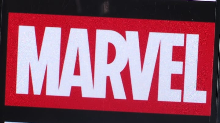 In this photo illustration, Marvel Entertainment logo seen...