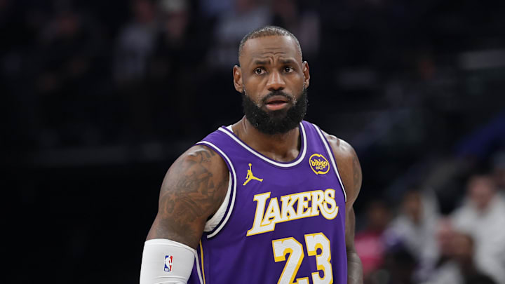 Dec 18, 2025; Salt Lake City, Utah, USA;  Los Angeles Lakers forward Lebron James (23) holds the ball during the second quarter against the Utah Jazz at Delta Center.