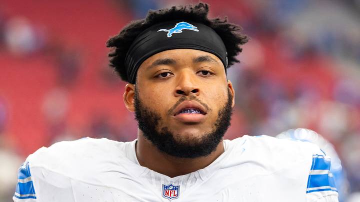 Detroit Lions offensive lineman Miles Frazier (71) looks on