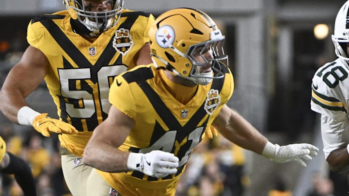 Oct 26, 2025; Pittsburgh, Pennsylvania, USA; Green Bay Packers wide receiver Malik Heath (18) runs up the sideline against Pittsburgh Steelers linebacker Payton Wilson (41) during the first quarter at Acrisure Stadium. Mandatory Credit: Barry Reeger-Imagn Images Oct 26, 2025; Pittsburgh, Pennsylvania, USA; Green Bay Packers wide receiver Malik Heath (18) runs up the sideline against Pittsburgh Steelers linebacker Payton Wilson (41) during the first quarter at Acrisure Stadium. Mandatory Credit: Barry Reeger-Imagn Images