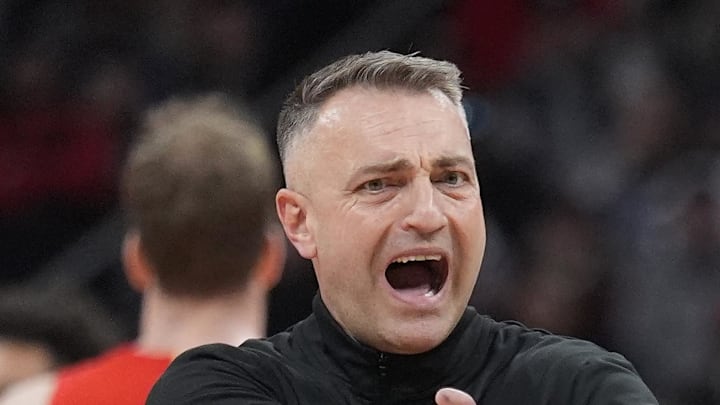 Toronto Raptors head coach Darko Rajakovic reacts to a call in favour of the Detroit Pistons.