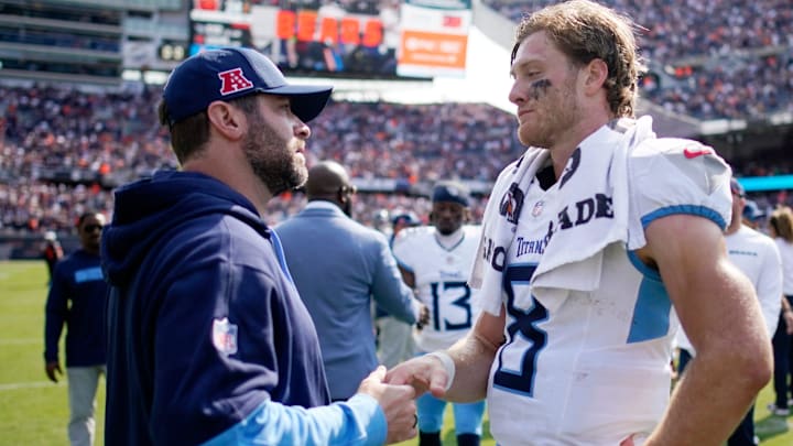 Tennessee Titans Head Coach Brian Callahan talks with quarterback Will Levis (8) on the field after their 24-17 loss against the Chicago Bears at Soldier Field in Chicago, Ill., Sunday, Sept. 8, 2024.