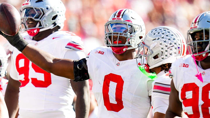 Ohio State Buckeyes linebacker Sonny Styles celebrates after intercepting a pass in the first half at Camp Randall Stadium