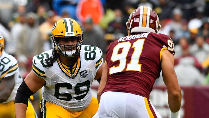 Sep 23, 2018; Landover, MD, USA; Green Bay Packers offensive tackle David Bakhtiari (69) prepares to block Washington Redskins linebacker Ryan Kerrigan (91) during the first half at FedEx Field. Mandatory Credit: Brad Mills-USA TODAY Sports