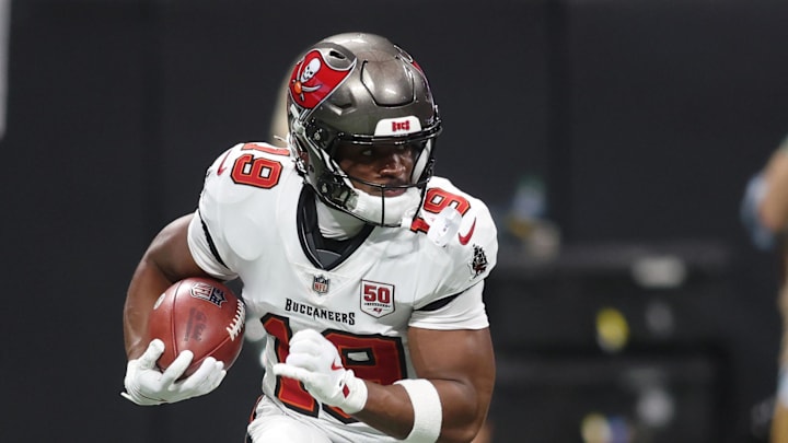 Tampa Bay Buccaneers wide receiver Kameron Johnson (19) runs with the ball against the Atlanta Falcons.