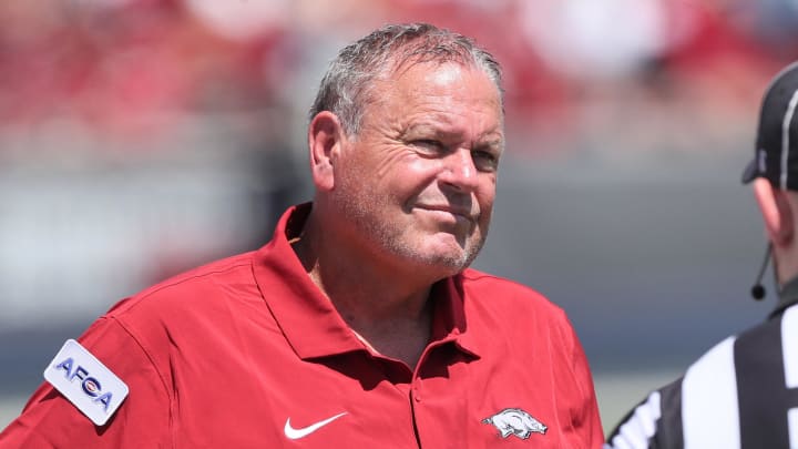 Arkansas Razorbacks coach Sam Pittman talks to an official during the first half against the Western Carolina Catamounts at War Memorial Stadium in Little Rock, Ark.